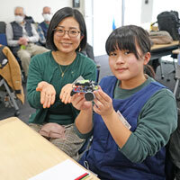 サポートスタッフの池上さんと参加者の島津さんの写真